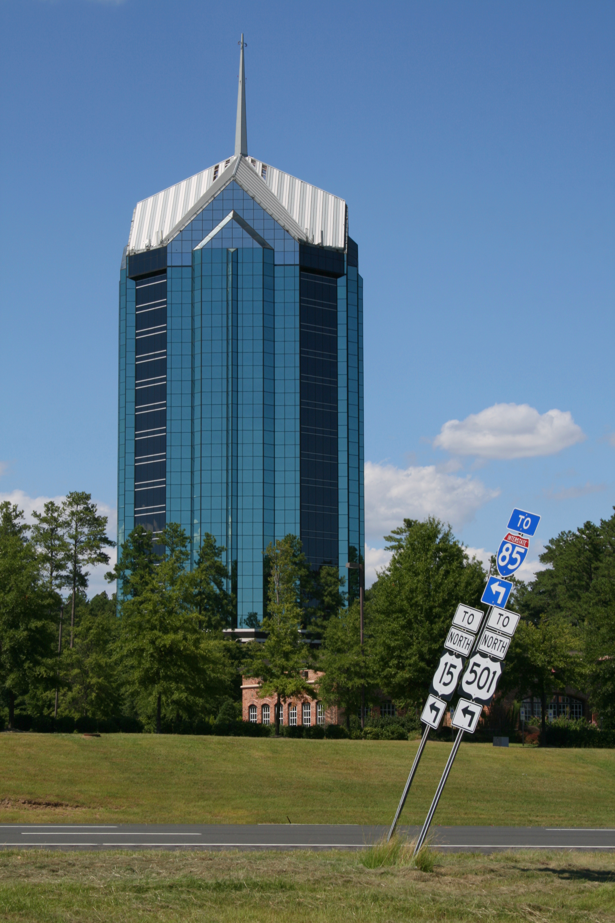 A tall building surrounded by low density suburbs